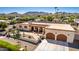 Aerial view of a stunning home with a courtyard entry and two-car garage at 3357 E Gold Dust Ave, Phoenix, AZ 85028