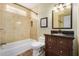 Clean bathroom with a tub, toilet and vanity at 3357 E Gold Dust Ave, Phoenix, AZ 85028