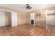 Bright bedroom with ceiling fan, tile floors, and ample closet space at 3357 E Gold Dust Ave, Phoenix, AZ 85028