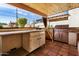 Outdoor kitchen with stainless steel grill and prep area at 3357 E Gold Dust Ave, Phoenix, AZ 85028