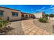 Inviting patio with terracotta tile flooring and a lovely fountain at 3357 E Gold Dust Ave, Phoenix, AZ 85028