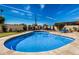 Large kidney-shaped pool perfect for entertaining at 3357 E Gold Dust Ave, Phoenix, AZ 85028