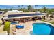 Aerial view of the pool, patio, and solar panels at 3357 E Gold Dust Ave, Phoenix, AZ 85028