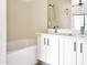 Bathroom with double vanity and bathtub at 3427 E Lance Ln, Phoenix, AZ 85018