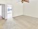 Carpeted bedroom with door leading to balcony at 3427 E Lance Ln, Phoenix, AZ 85018