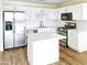 Modern kitchen with stainless steel appliances and white cabinets at 3427 E Lance Ln, Phoenix, AZ 85018