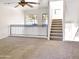 Spacious loft area with carpet flooring and ceiling fan at 3427 E Lance Ln, Phoenix, AZ 85018