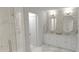 Elegant bathroom with double vanity, large mirrors, and a shower at 3529 S Kings Ranch Ct, Gold Canyon, AZ 85118