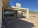 Exterior shot of a modern home showcasing the architecture and desert surroundings, still under construction at 3529 S Kings Ranch Ct, Gold Canyon, AZ 85118