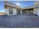 New construction home with a contemporary design and covered patio at 3529 S Kings Ranch Ct, Gold Canyon, AZ 85118