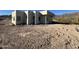 Modern desert home under construction with attached garage at 3529 S Kings Ranch Ct, Gold Canyon, AZ 85118