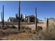 Exterior of a desert home under construction, showcasing modern design and natural surroundings at 3529 S Kings Ranch Ct, Gold Canyon, AZ 85118