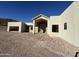 Contemporary home with large windows and attached garage at 3529 S Kings Ranch Ct, Gold Canyon, AZ 85118