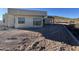 New construction home with stucco exterior and large windows at 3529 S Kings Ranch Ct, Gold Canyon, AZ 85118