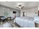 Bright bedroom with wood flooring and ceiling fan at 3548 E Mesquite St, Gilbert, AZ 85296