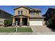 Two-story house with a landscaped yard and a welcome sign at 3548 E Mesquite St, Gilbert, AZ 85296