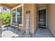 Front porch with a bench and welcome sign at 3548 E Mesquite St, Gilbert, AZ 85296