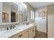 Double vanity bathroom with marble countertops at 36080 W Merced St, Maricopa, AZ 85138