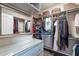 Large walk-in closet with custom shelving at 36080 W Merced St, Maricopa, AZ 85138