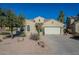 Single-story house with a two-car garage and desert landscaping at 36080 W Merced St, Maricopa, AZ 85138