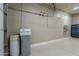 Garage with water softener and filtration system at 36080 W Merced St, Maricopa, AZ 85138