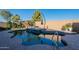 Inviting backyard pool and spa with ample space for lounging and entertaining at 36080 W Merced St, Maricopa, AZ 85138