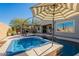 Enjoy this luxurious spa and refreshing pool, perfect for relaxation at 36080 W Merced St, Maricopa, AZ 85138