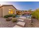 Landscaped backyard with pool and patio at 42405 N Anthem Creek Dr, Anthem, AZ 85086