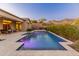 Relaxing backyard pool and patio area at 42405 N Anthem Creek Dr, Anthem, AZ 85086