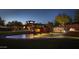 Anthem Country Club entrance with fountain at night at 42405 N Anthem Creek Dr, Anthem, AZ 85086