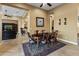 Open dining room with views into living room and kitchen at 42405 N Anthem Creek Dr, Anthem, AZ 85086