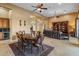 Spacious dining area with a large oval table and chairs at 42405 N Anthem Creek Dr, Anthem, AZ 85086