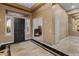 Elegant entryway with tile flooring, a dark front door and views into an office at 42405 N Anthem Creek Dr, Anthem, AZ 85086