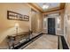 Bright entryway with tile flooring and elegant console table at 42405 N Anthem Creek Dr, Anthem, AZ 85086