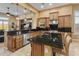 Spacious kitchen with island, stainless steel appliances, and ample cabinetry at 42405 N Anthem Creek Dr, Anthem, AZ 85086