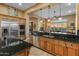 Gourmet kitchen with large island, stainless steel appliances, and granite at 42405 N Anthem Creek Dr, Anthem, AZ 85086