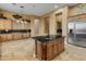 Island kitchen with granite countertops and a breakfast bar at 42405 N Anthem Creek Dr, Anthem, AZ 85086