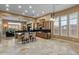 Gourmet kitchen boasts ample cabinetry, granite counters, and an island with seating at 42405 N Anthem Creek Dr, Anthem, AZ 85086