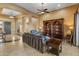 Living room with built-in shelving and comfortable seating at 42405 N Anthem Creek Dr, Anthem, AZ 85086