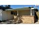 Backyard patio with stone bar and covered area at 4415 W Palo Verde Ave, Glendale, AZ 85302