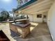 Outdoor kitchen and patio area with stone countertops at 4415 W Palo Verde Ave, Glendale, AZ 85302