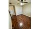 Simple bedroom with wood flooring and ceiling fan at 4415 W Palo Verde Ave, Glendale, AZ 85302