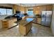 Bright kitchen with granite countertops and island at 4415 W Palo Verde Ave, Glendale, AZ 85302