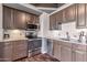 Modern kitchen with stainless steel appliances and granite countertops at 4750 N Central Ave # A3, Phoenix, AZ 85012