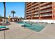 Community swimming pool with lounge chairs and a gazebo at 4750 N Central Ave # A3, Phoenix, AZ 85012