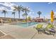 Relaxing pool area with lush landscaping and comfortable seating at 4750 N Central Ave # A3, Phoenix, AZ 85012