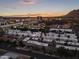 A vibrant neighborhood view featuring flat rooftops and nearby mountain views at 4825 N 72Nd Way, Scottsdale, AZ 85251