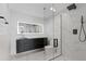 Spa-like bathroom with marble tile and glass shower at 4825 N 72Nd Way, Scottsdale, AZ 85251