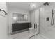 Modern bathroom with a glass enclosed shower, sleek fixtures, and marble accents at 4825 N 72Nd Way, Scottsdale, AZ 85251