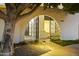 Exterior image of the walkway to the wrought iron gate and arched entry at 4825 N 72Nd Way, Scottsdale, AZ 85251